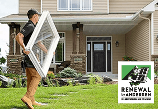 contractor carrying andersen window with renewal by andersen logo