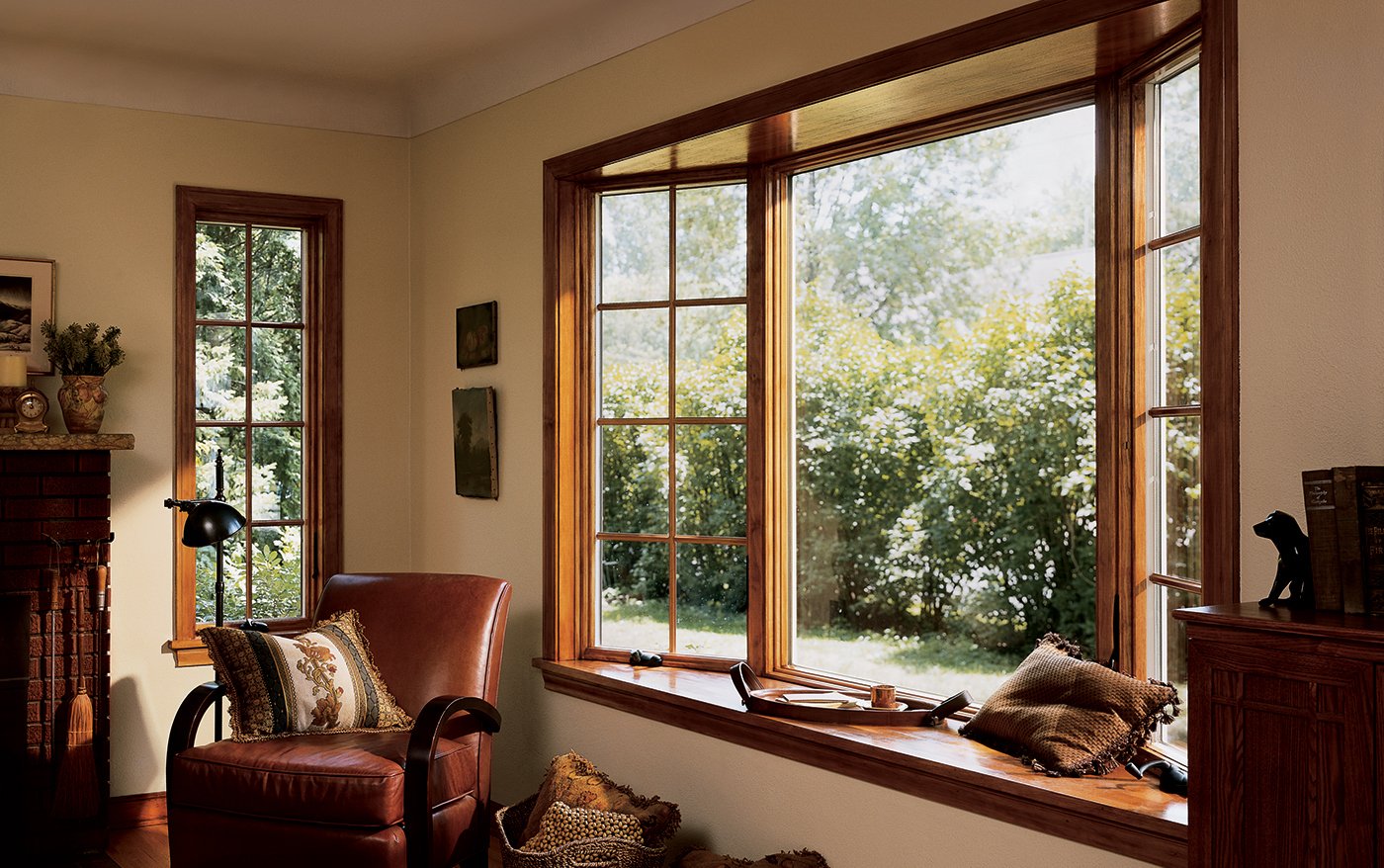 An interior shot of a living room with a large Andersen® 400 Series Bay Window